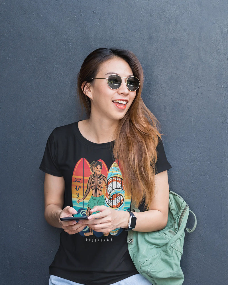 Pinay in sunglasses wearing the black Surfin' Siargao Badlit shirt — Filipino surf shirt by PirmaPinas