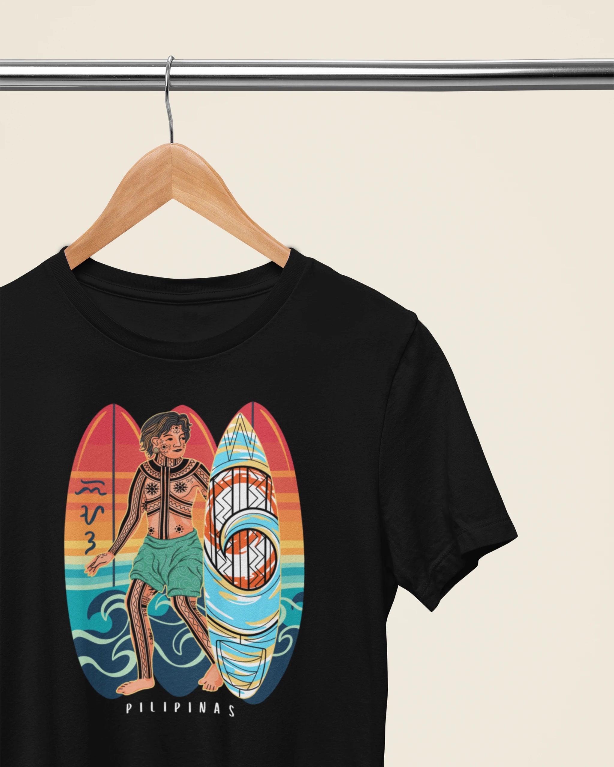 Black Surfin' Siargao Badlit shirt on a wooden hanger