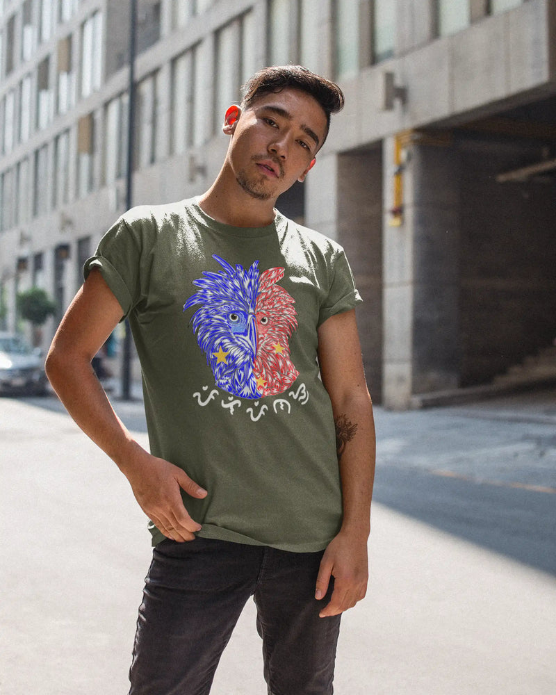 Man wearing an army green Philippine Eagle shirt with Pilipinas Baybayin script in the city
