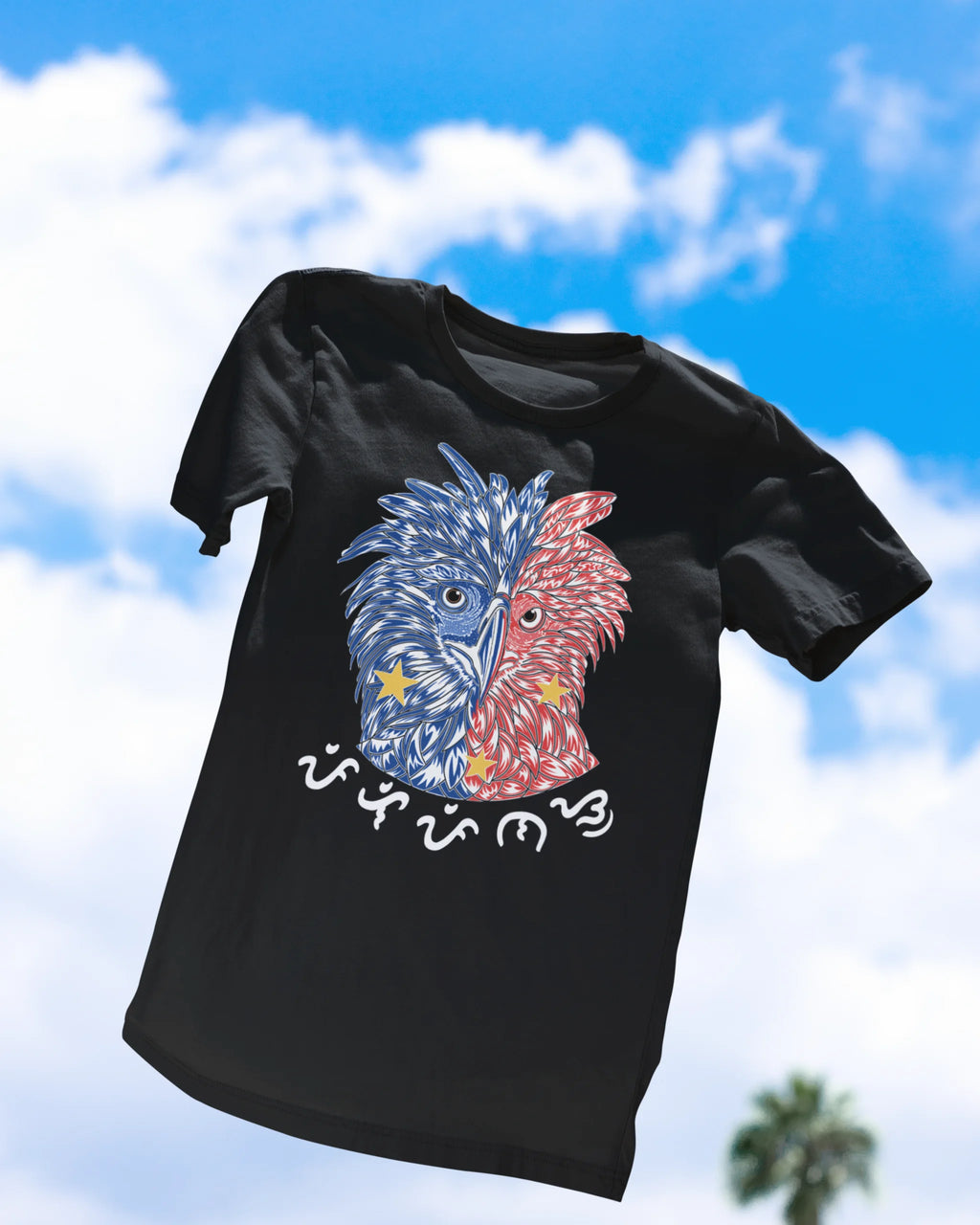 Black Philippine Eagle Pilipinas shirt floating against a blue sky