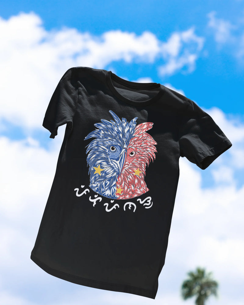 Black Philippine Eagle Pilipinas shirt floating against a blue sky