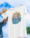 White filipino tribal art shirt held up against the sky, showing the koi and sun graphic.