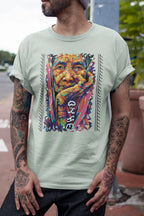 Filipino heritage T-shirt with Apo Whang Od portrait, colorful batok design, and Baybayin text