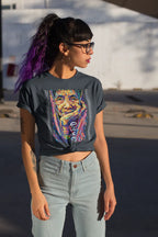 Dark grey Apo Whang Od T-shirt featuring colorful Filipino batok-inspired artwork and Batikan in Baybayin worn by a Gen-Z Filipina