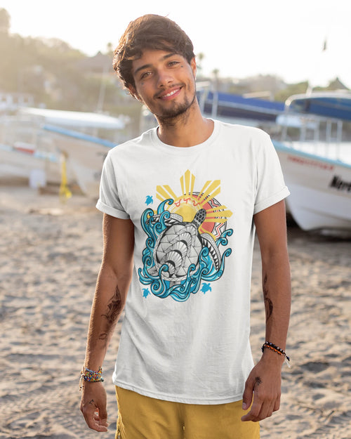 Baybayin Malaya Pawikan tee in white – worn by a tattooed Tourist in El Nido