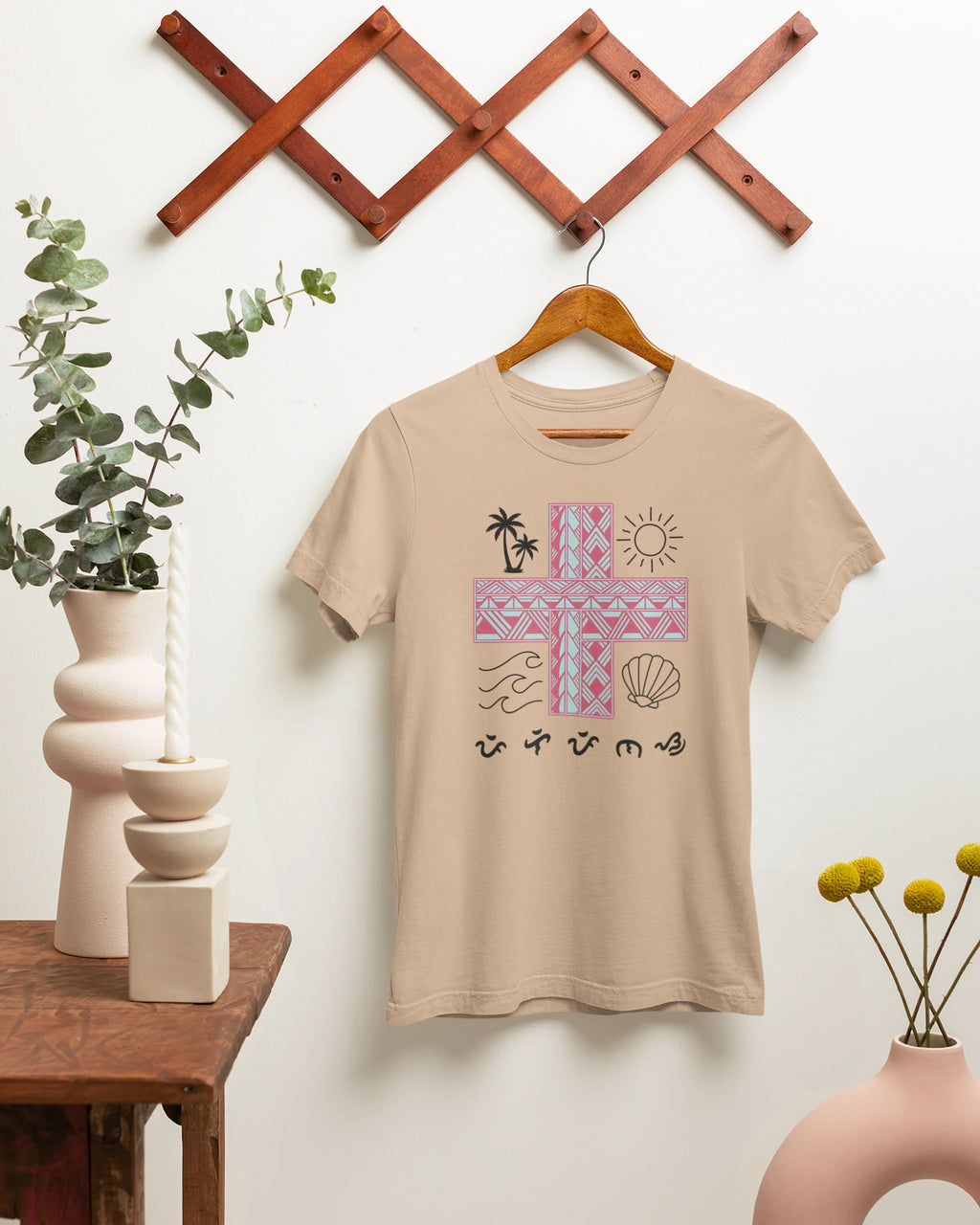Tan Pilipinas shirt on a wooden hanger, a rustic view of this Baybayin filipino heritage shirt.