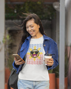 Pinay checking her phone in a Baybayin t-shirt, street-style filipino streetwear look.