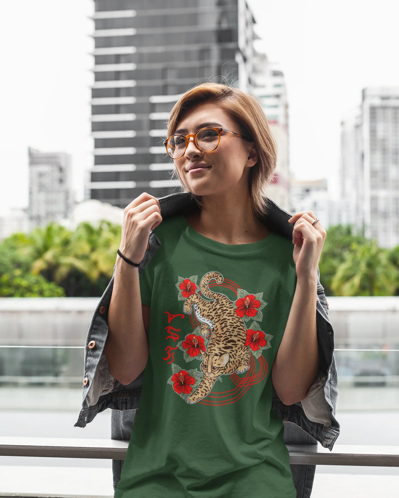 Model posing streetside in a Badlit tee with Visayan script and leopard cat print