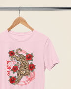 Soft pink philippines wildlife tee on a wooden hanger, Visayan leopard cat Badlit design