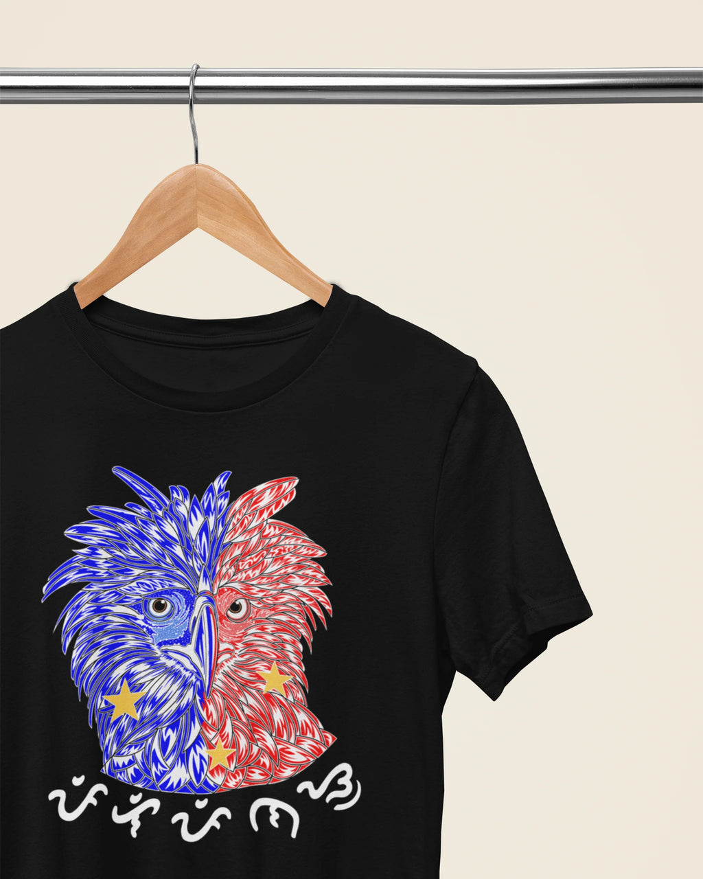 Black Philippine Eagle Pilipinas Baybayin tee on a wooden hanger, front design view