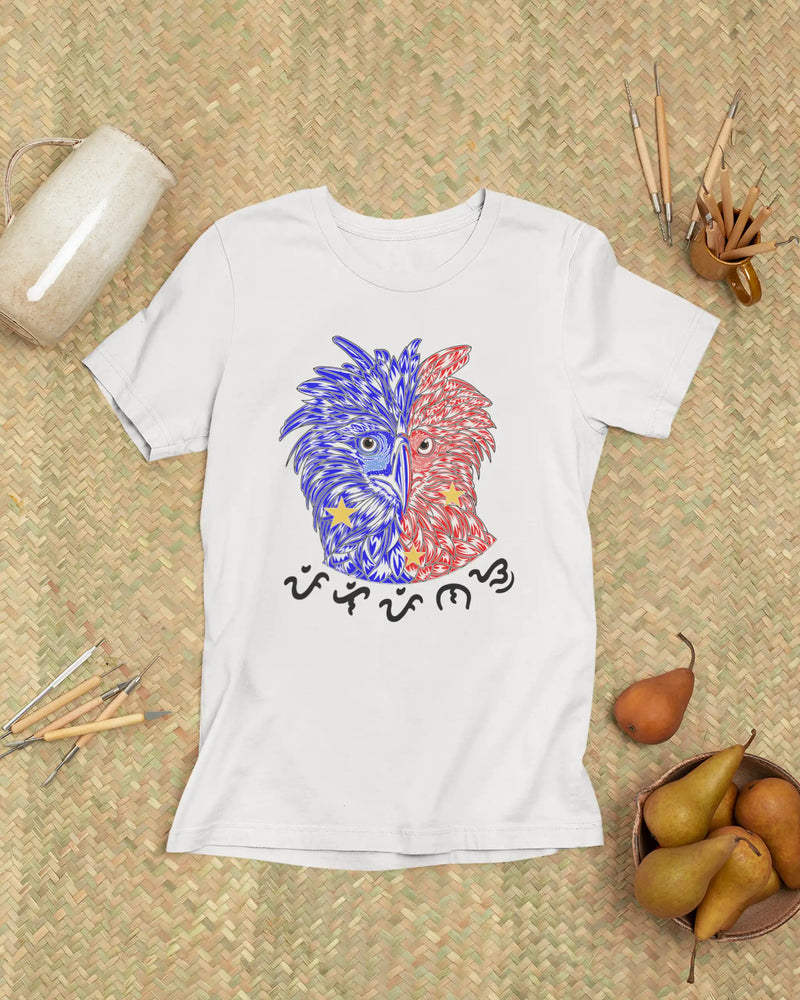 White Philippine Eagle Pilipinas Baybayin tee laid flat on a woven banig