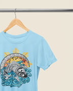 Ocean blue Pilipinas koi shirt on a wooden hanger, true-color view of the tribal art design.