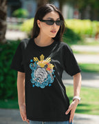 Baybayin Malaya Pawikan tee in black – close-up lifestyle shot at golden hour