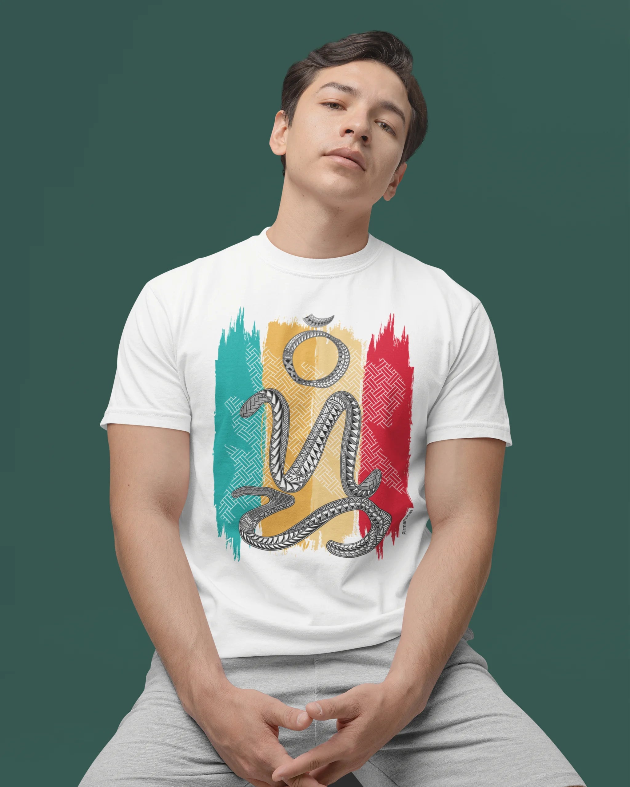 Man in a white suwat bisaya shirt with Badlit script print, studio portrait