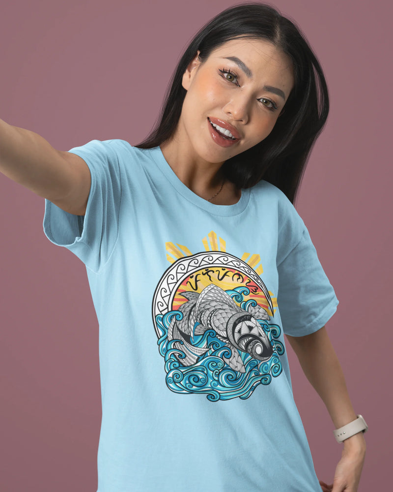 Ocean blue Baybayin koi tee in a selfie shot, a pilipinas shirt with tribal wave art.