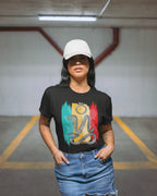 Woman wearing a black bisaya shirt with Badlit suwat script, in a parking garage